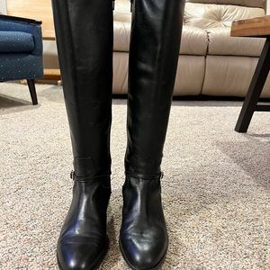 Size 8.5 Black leather riding boots with gold detail.